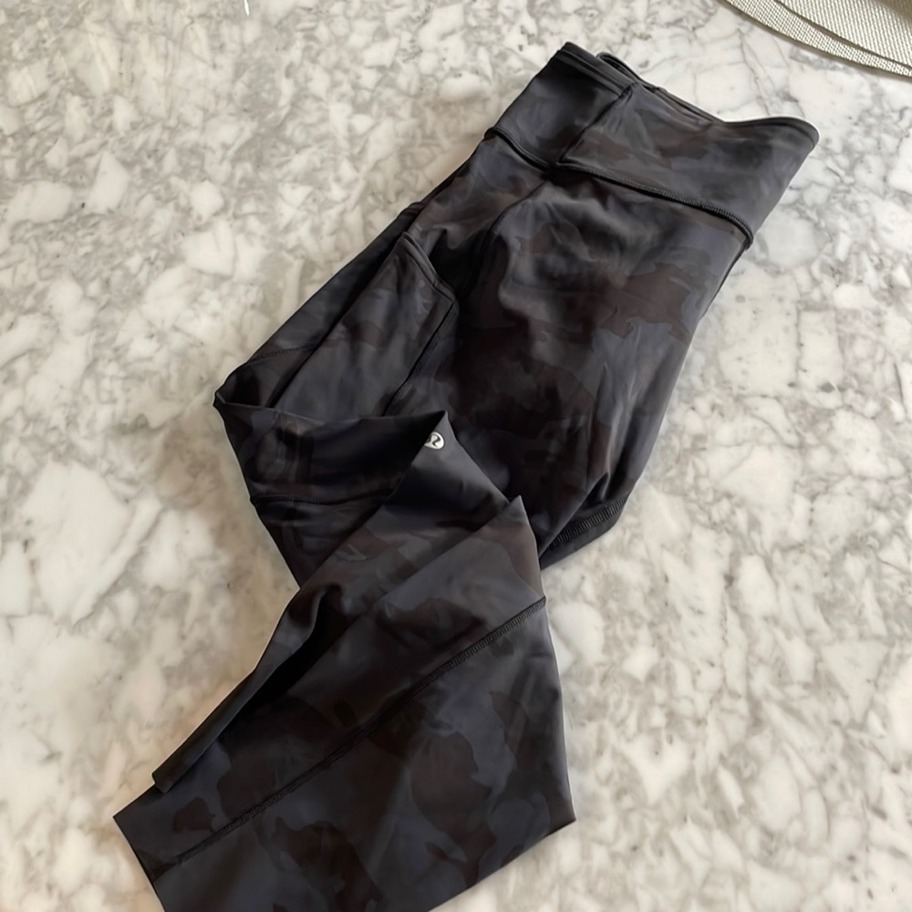 Lululemon leggings with pocket. Camo fabric. Size 12.